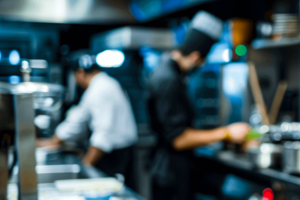 Chef en action dans une cuisine professionnelle – un cadre idéal pour les solutions compostables en restauration.